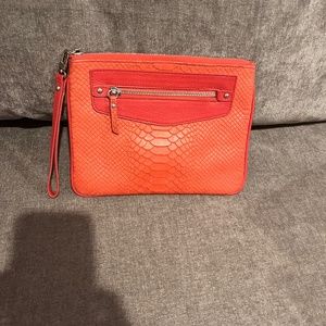 GiGi wristlet  orange coral color